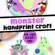 Child working on monster handprint craft with craft supplies on activity tray like construction paper, markers, pom poms, pipe cleaners, googly eyes, glue stick, and more with examples.