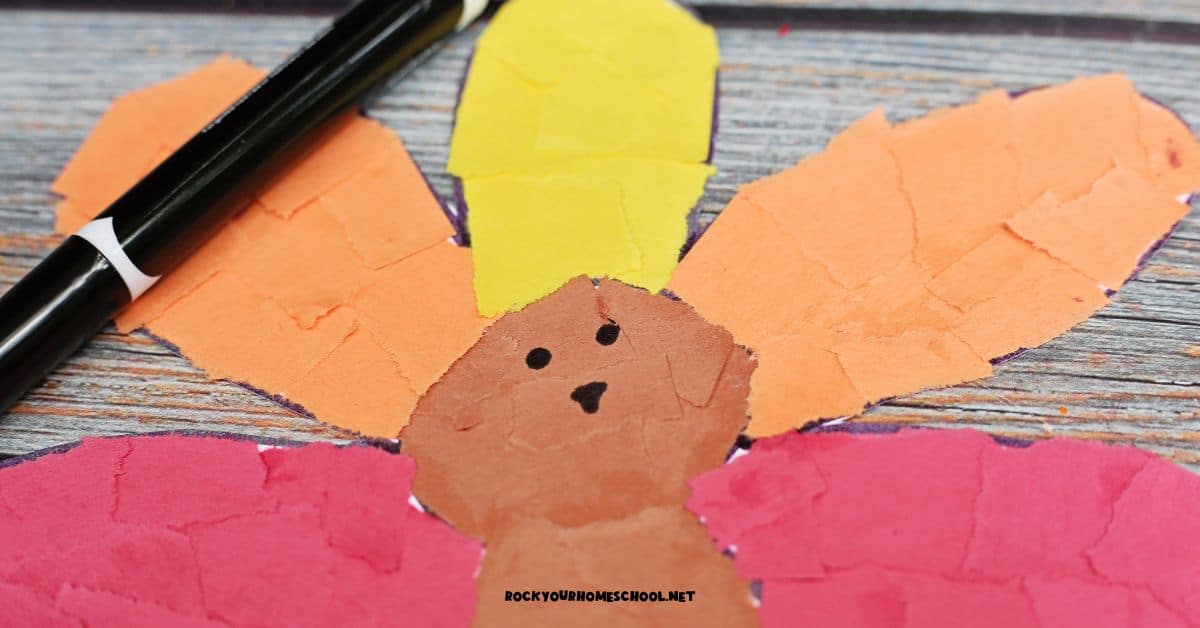 Torn paper turkey craft with black marker to add simple turkey face.