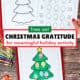 Woman holding free printable pages of Christmas tree gratitude activity with example of Christmas lights on silver ribbon.