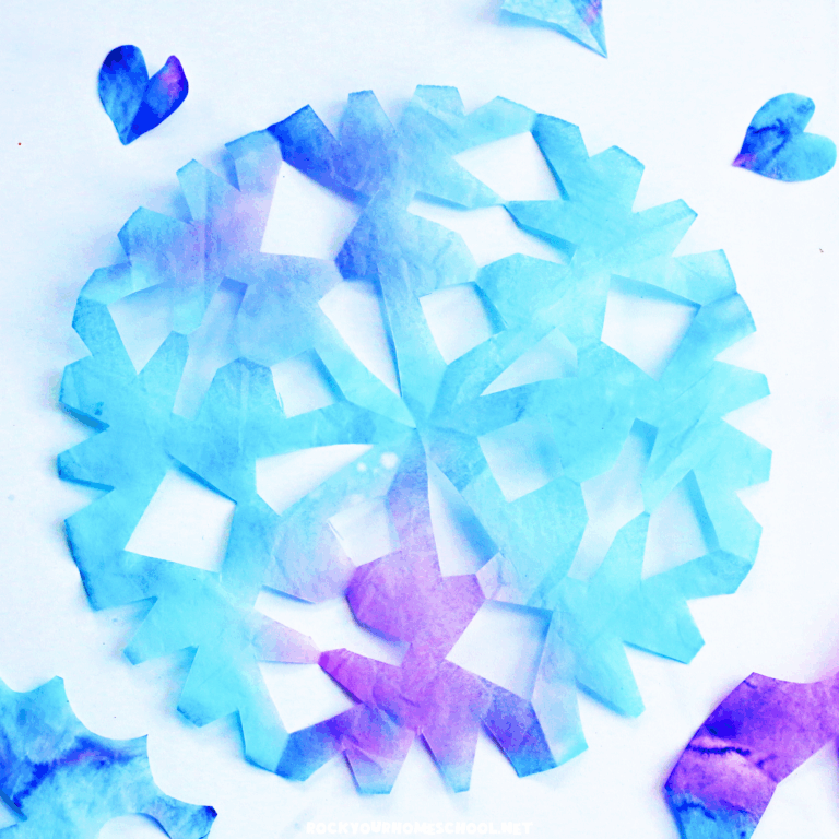 Example of coffee filter snowflakes for kids in blues and purples.