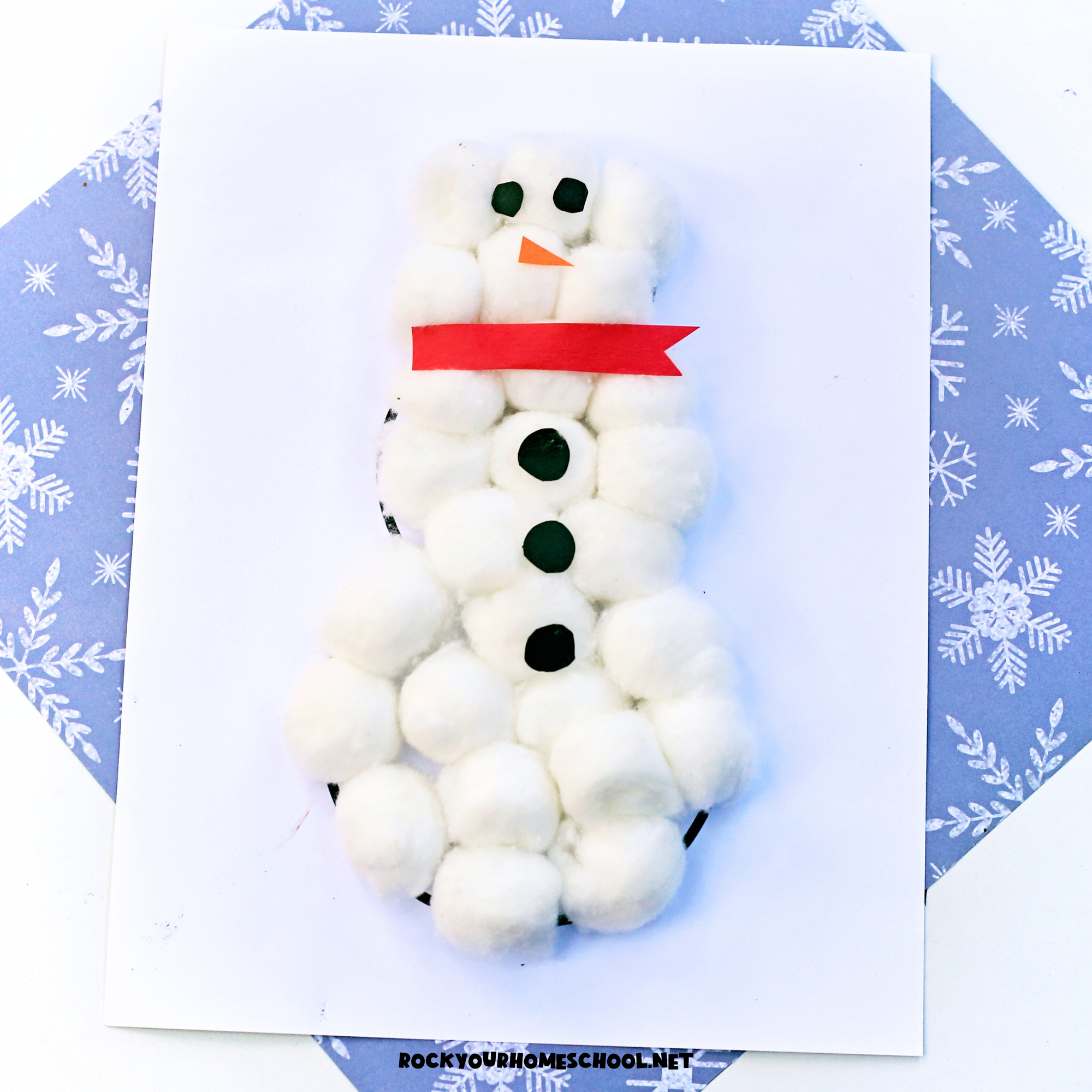 Example of cute and easy cotton ball snowman craft.