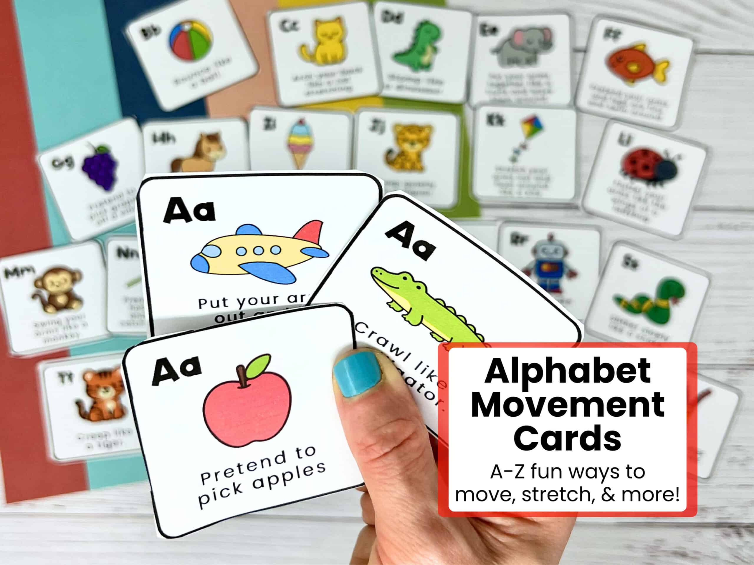 Woman holding 3 letter Aa movement cards with examples in background.