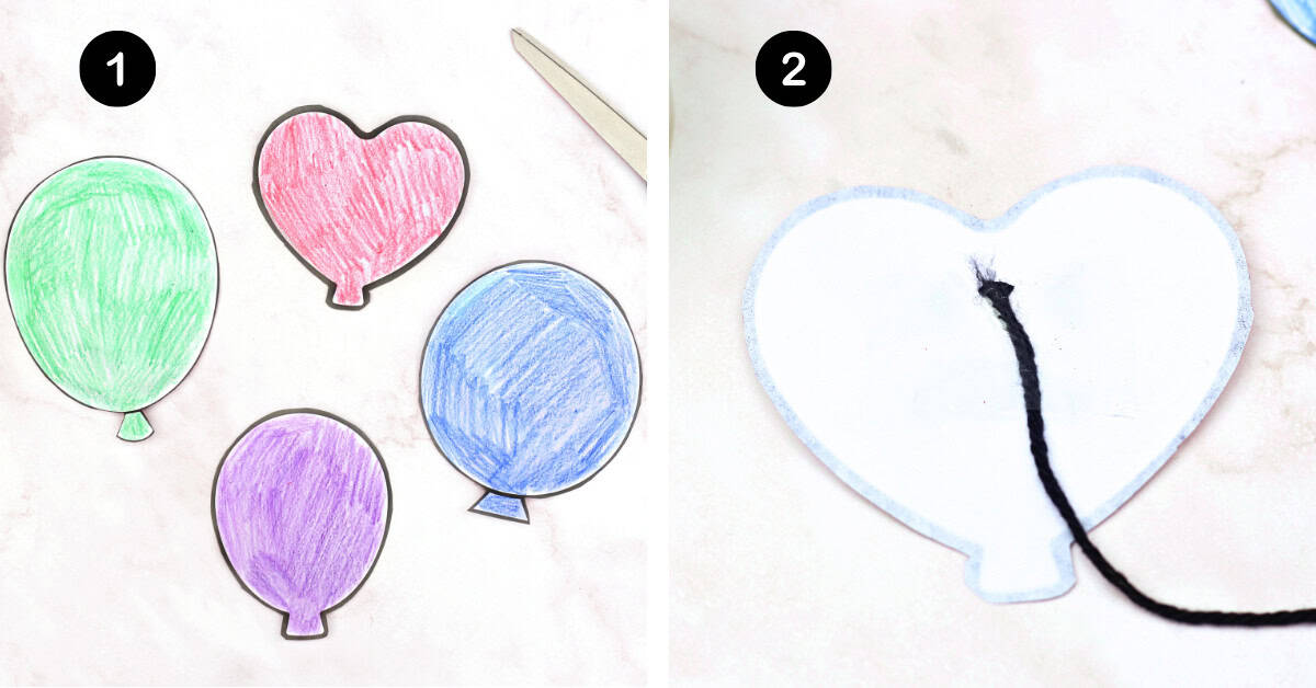 Cut outs of paper balloons with black yarn on back of heart-shaped balloon.