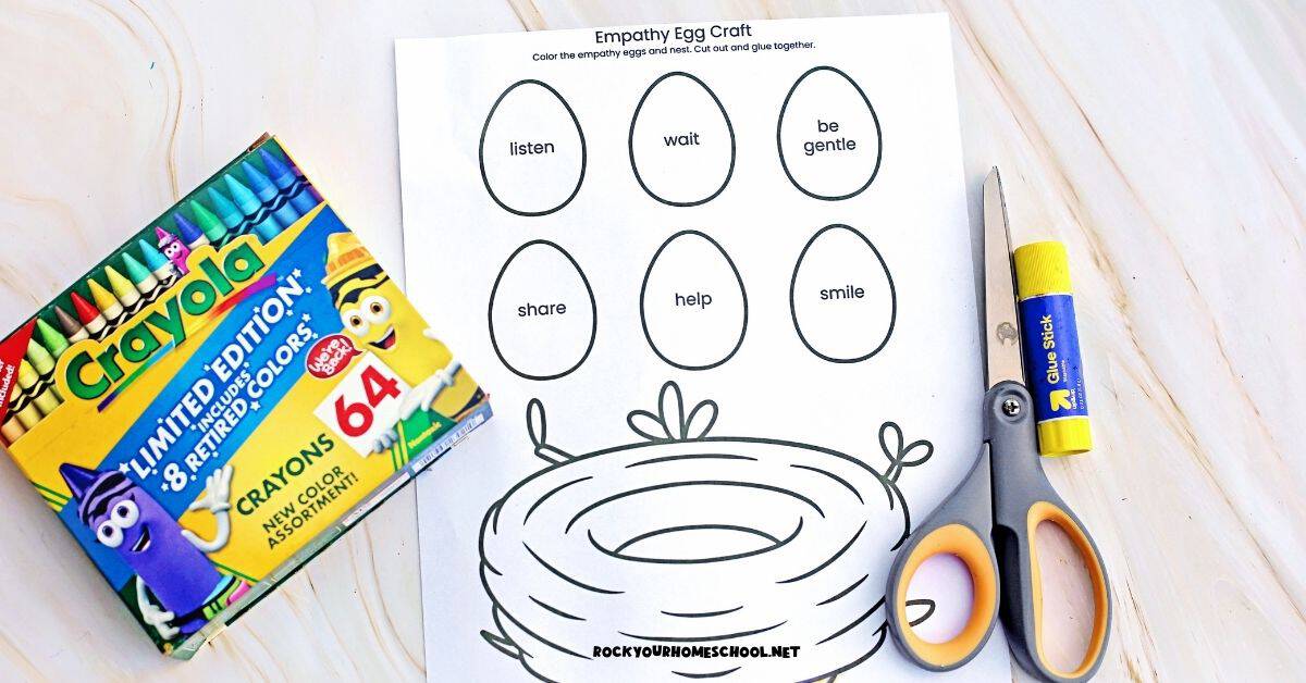 Box of crayons, scissors, glue stick, and free printable empathy eggs craft.