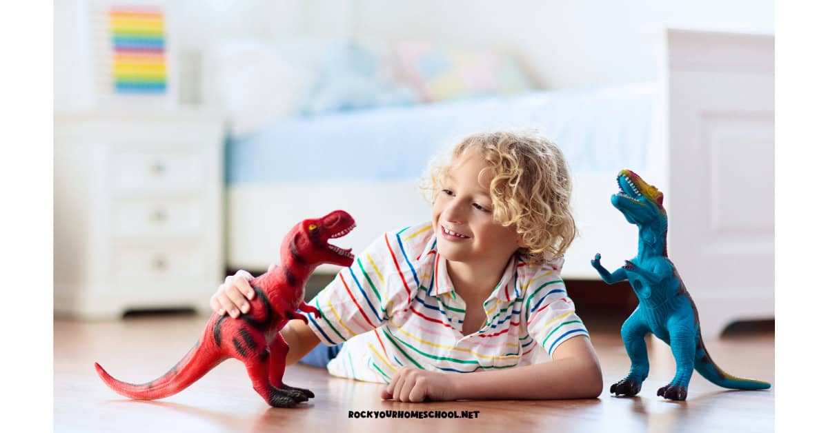 Young child playing with dinosaurs to feature this cool preschool summer theme.