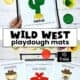 Woman holding examples of wild west playdough mats including cactus, cowgirl, bandana, and cowboy.