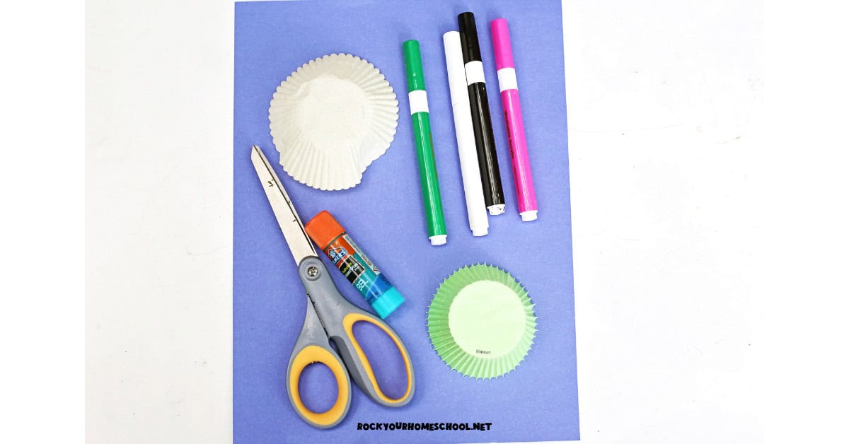 Blue construction paper, white and green cupcake liners, markers, glue stick, and scissors for this fable craft for The Tortoise and The Hare.