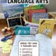Basket filled with Learning Language Arts Through Literature books and classic read-alouds, surrounded by crayons, scissors, sight word cards, and a chalkboard sign that reads 1st grade.