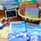 Homeschool language arts curriculum basket display featuring Learning Language Arts Through Literature books alongside classic children's books including Goodnight Moon and The Runaway Bunny.
