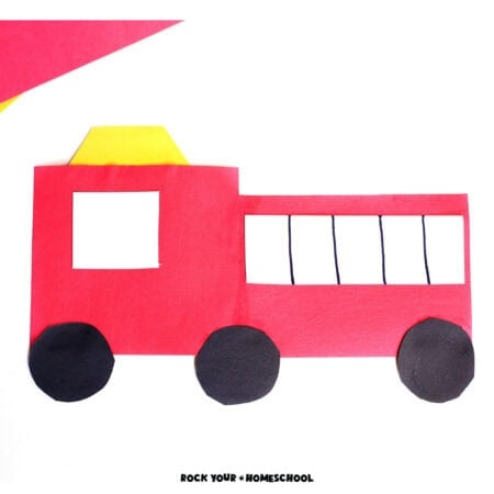 Example of basic shapes paper fire truck craft with free template.